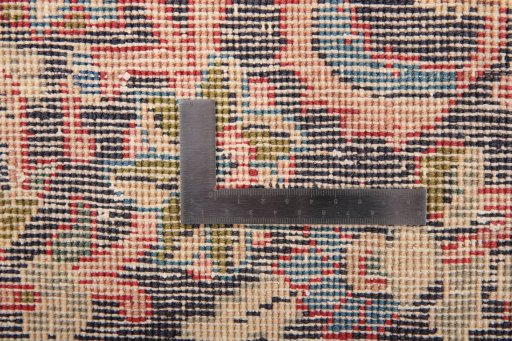 Surface texture of 1980s Vintage rug with natural Wool and intricate pattern