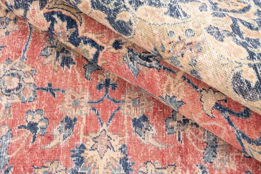Corner detail of 1950s Vintage rug showing border pattern and Wool pile