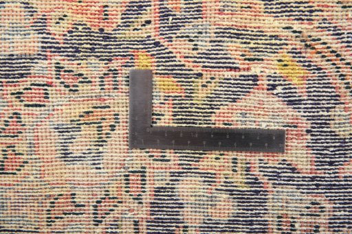Surface texture of 1980s Vintage rug with natural Wool and intricate pattern
