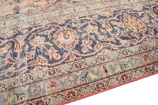 Backside of handmade 1980s Vintage rug showing knot structure and weave density