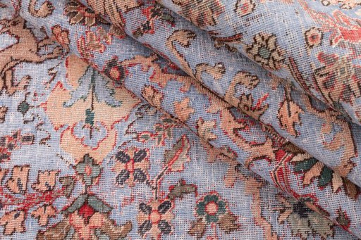Close-up detail of 1950s Vintage rug from Iran / Persia showing Wool weave