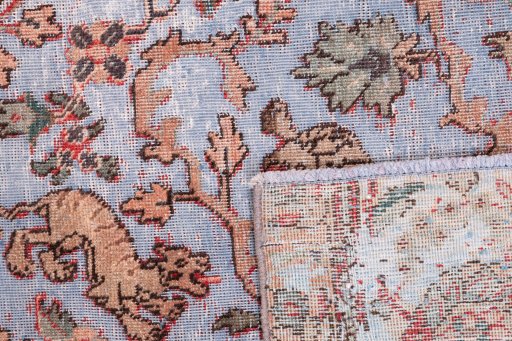 Close-up detail of 1950s Vintage rug from Iran / Persia showing Wool weave
