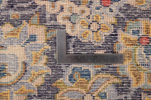 Backside of handmade 1980s Vintage rug showing knot structure and weave density