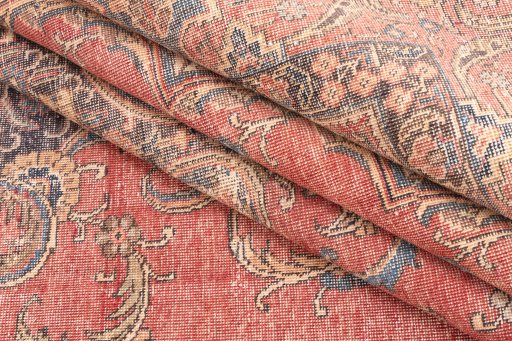 Surface texture of 1955s Vintage rug with natural Wool and intricate pattern