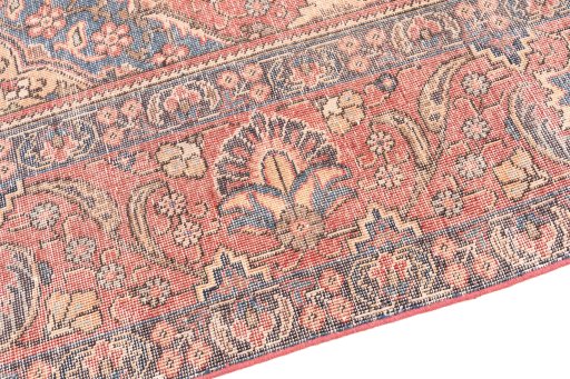 Surface texture of 1955s Vintage rug with natural Wool and intricate pattern