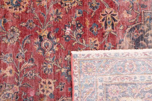 Close-up detail of 1950s Vintage rug from Iran / Persia showing Wool weave