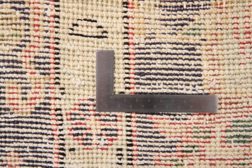 Surface texture of 1980s Vintage rug with natural Wool and intricate pattern