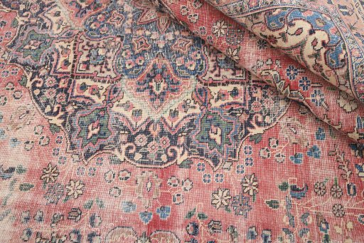 Close-up detail of 1970s Vintage rug from Iran / Persia showing Wool weave