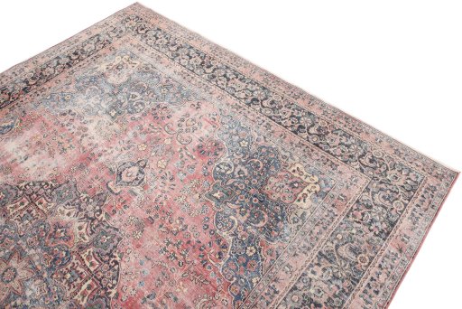 Surface texture of 1970s Vintage rug with natural Wool and intricate pattern