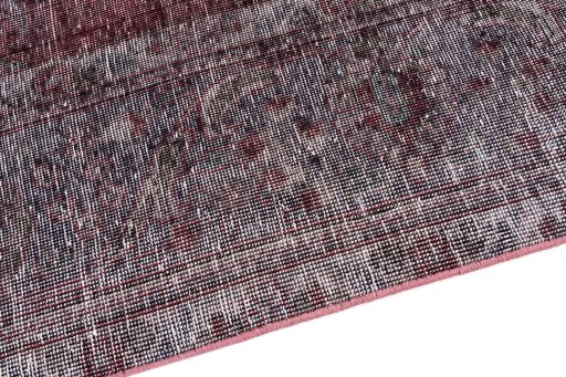 Backside of handmade 1950s Vintage rug showing knot structure and weave density