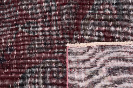 Close-up detail of 1950s Vintage rug from Iran / Persia showing Wool weave