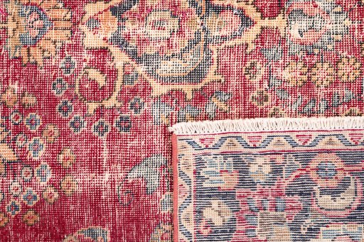 Close-up detail of 1950s Vintage rug from Iran / Persia showing Wool weave