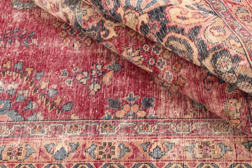 Corner detail of 1950s Vintage rug showing border pattern and Wool pile