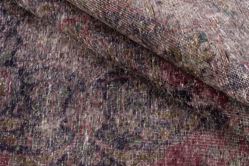 Corner detail of 1955s Vintage rug showing border pattern and Wool pile