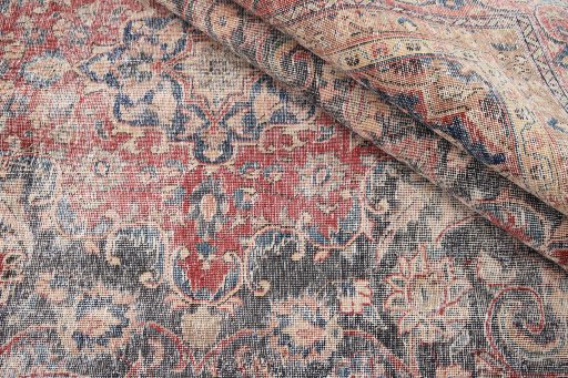 Close-up detail of 1970s Vintage rug from Iran / Persia showing Wool weave