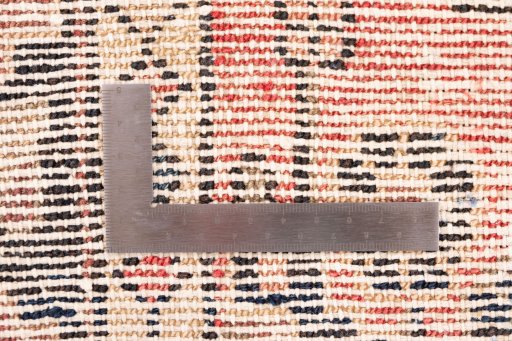Corner detail of 1950s Vintage rug showing border pattern and Wool pile