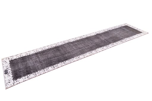 Corner detail of 1975s Vintage rug showing border pattern and Wool pile