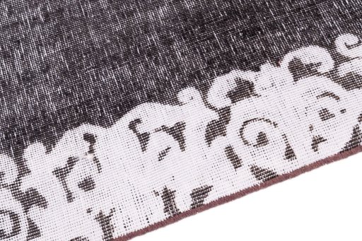 Backside of handmade 1975s Vintage rug showing knot structure and weave density