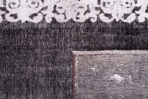 Close-up detail of 1975s Vintage rug from Iran / Persia showing Wool weave