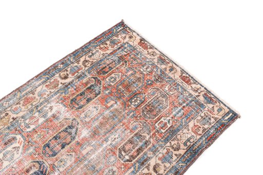 Surface texture of 1940s Vintage rug with natural Wool and intricate pattern