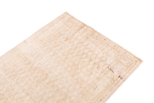 Surface texture of 1972s Vintage rug with natural Wool and intricate pattern