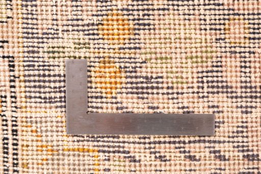 Corner detail of 1970s Vintage rug showing border pattern and Wool pile