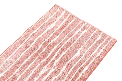 Surface texture of 1972s Vintage rug with natural Wool and intricate pattern