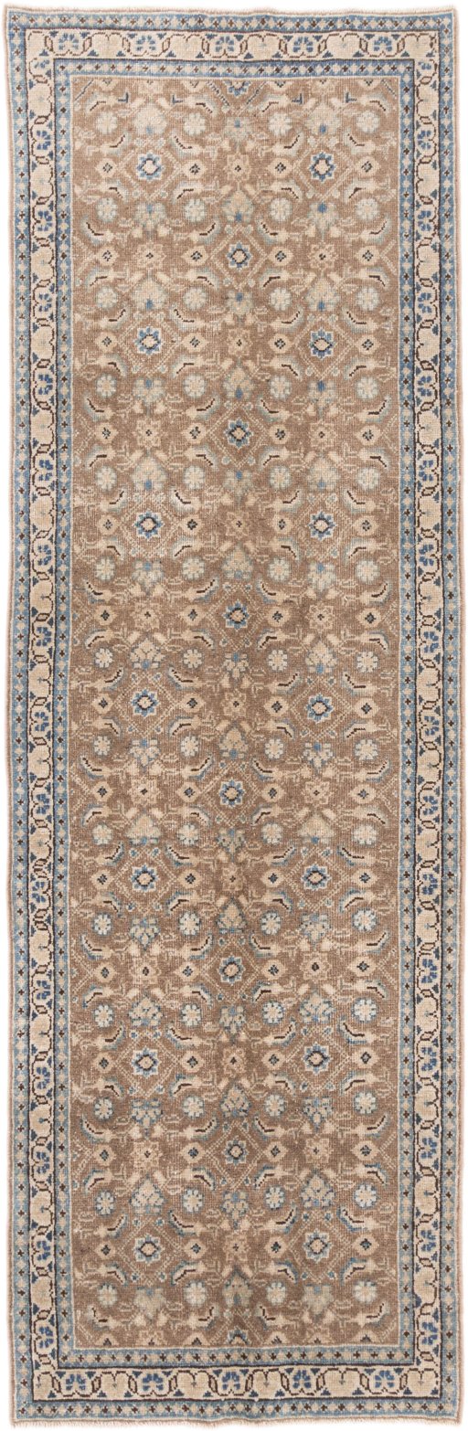Full view of 1970s Vintage rug from Iran / Persia, 328 × 102 cm in Red tones