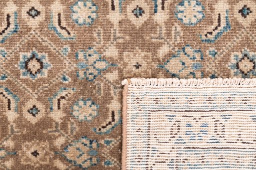 Close-up detail of 1970s Vintage rug from Iran / Persia showing Wool weave