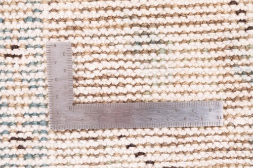 Corner detail of 1970s Vintage rug showing border pattern and Wool pile