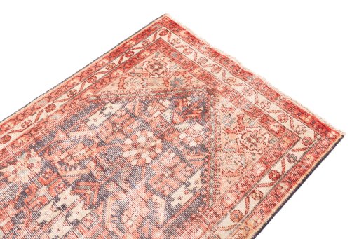 Surface texture of 1970s Vintage rug with natural Wool and intricate pattern