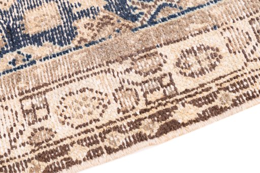 Backside of handmade 1970s Vintage rug showing knot structure and weave density