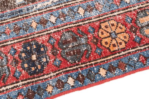 Backside of handmade 1970s Vintage rug showing knot structure and weave density