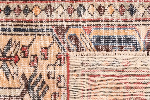 Close-up detail of 1970s Vintage rug from Iran / Persia showing Wool weave