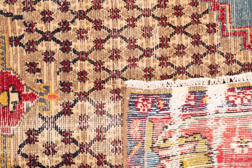 Close-up detail of 1971s Vintage rug from Iran / Persia showing Wool weave