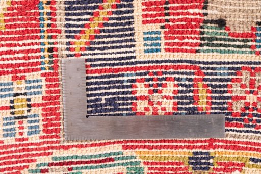 Corner detail of 1971s Vintage rug showing border pattern and Wool pile
