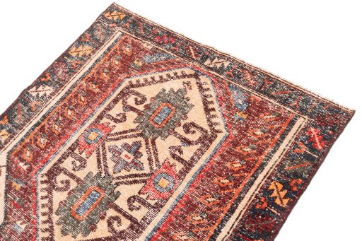 Surface texture of 1972s Vintage rug with natural Wool and intricate pattern
