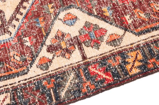 Backside of handmade 1972s Vintage rug showing knot structure and weave density