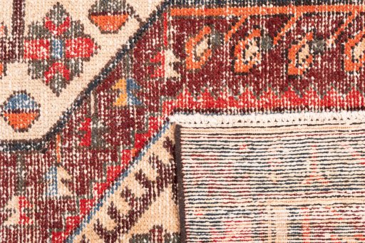 Close-up detail of 1972s Vintage rug from Iran / Persia showing Wool weave