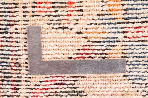 Corner detail of 1972s Vintage rug showing border pattern and Wool pile