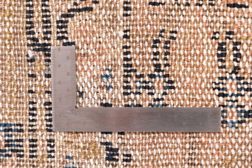 Corner detail of 1970s Vintage rug showing border pattern and Wool pile