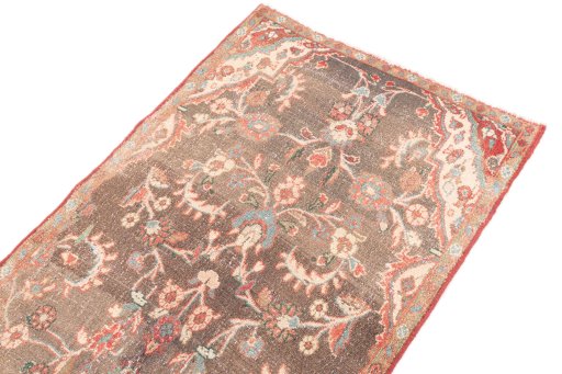 Surface texture of 1975s Vintage rug with natural Wool and intricate pattern