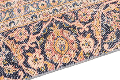 Backside of handmade 1977s Vintage rug showing knot structure and weave density