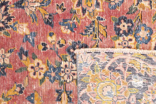 Close-up detail of 1977s Vintage rug from Iran / Persia showing Wool weave