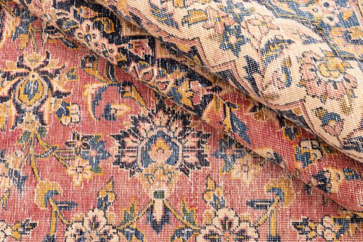 Corner detail of 1977s Vintage rug showing border pattern and Wool pile