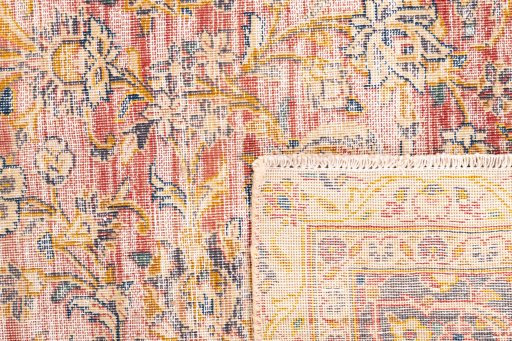 Close-up detail of 1975s Vintage rug from Iran / Persia showing Wool weave