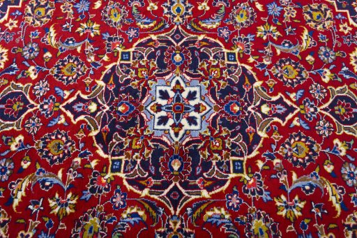 Central medallion detail of 2000s Kashan rug from Iran / Persia