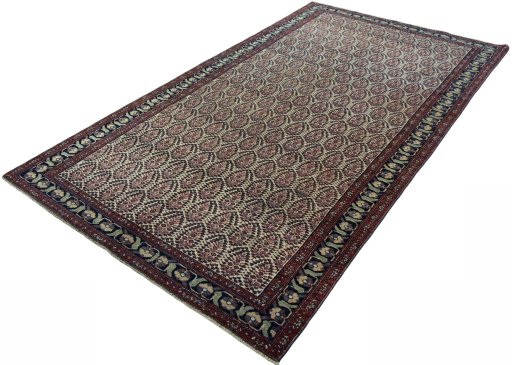 Corner detail of 1930s Hamedan rug showing border pattern and Wool pile
