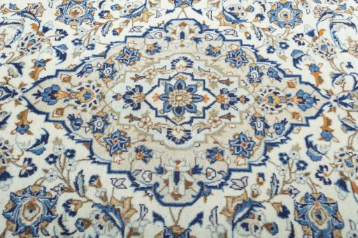 Central medallion detail of 2000s Kashan rug from Iran / Persia