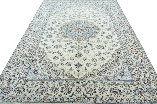 Surface texture of 2000s Nain rug with natural Wool and intricate pattern